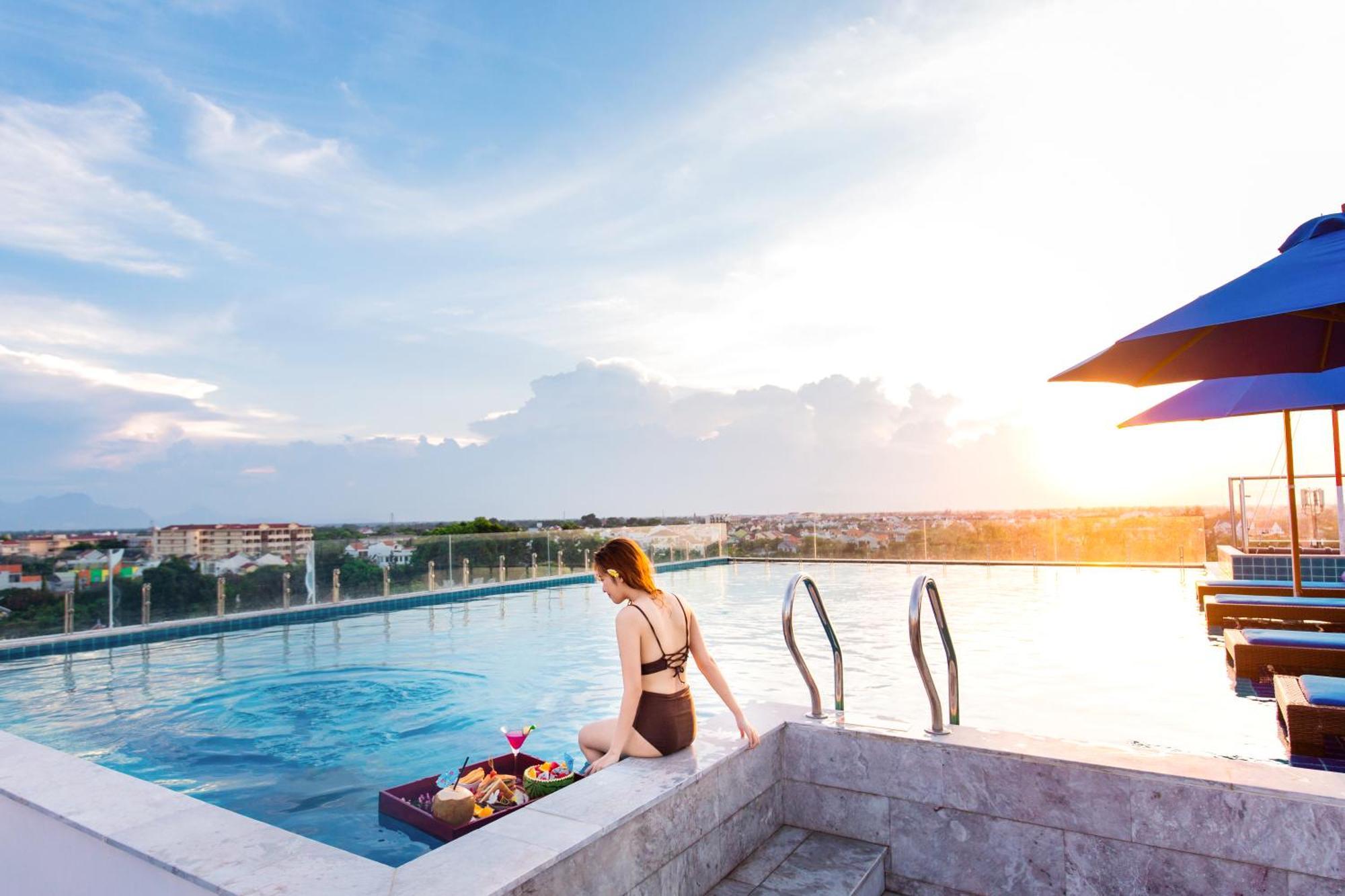 Qualia De Hotel Hoi An - Rooftop Bar City View ภายนอก รูปภาพ